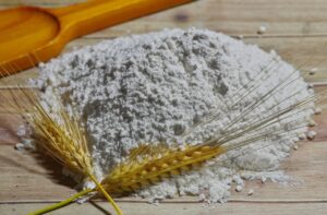photo farine de blé et épis de blé